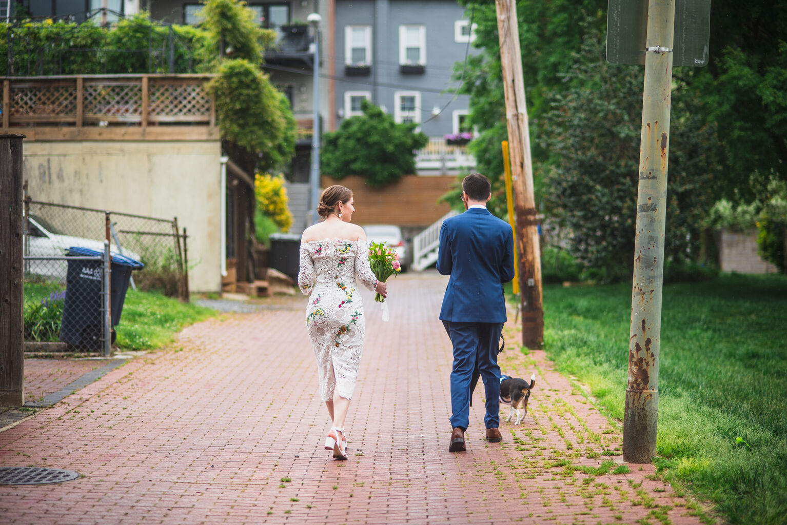Drew and Emily walking away from the camera